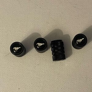 Mustang Logo valve Stem caps in Black set of 4 NWT